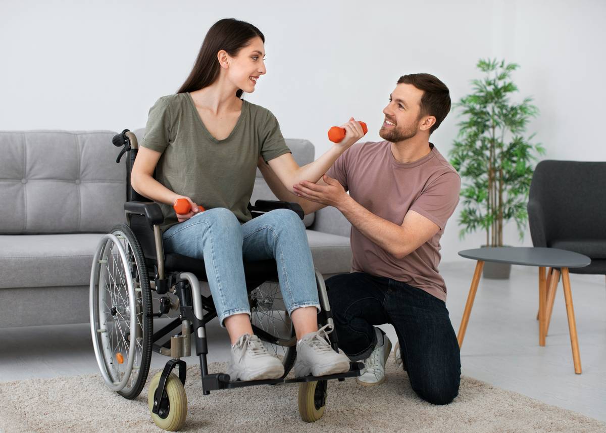 Woman using band chronic pain recovery tools for shoulder mobility exercise at home
